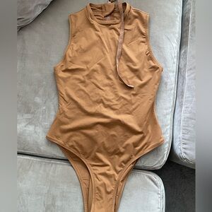Skims one piece tan bathing suit - Size M